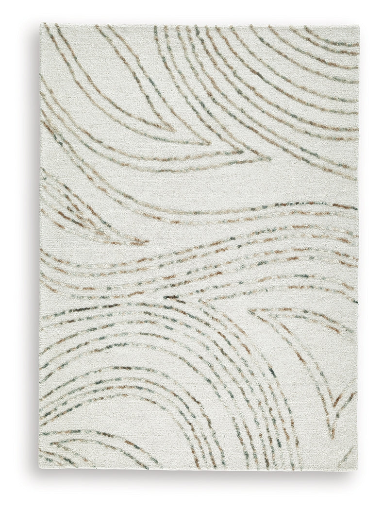 Close-up of hand tufted wool pile showing abstract pattern
