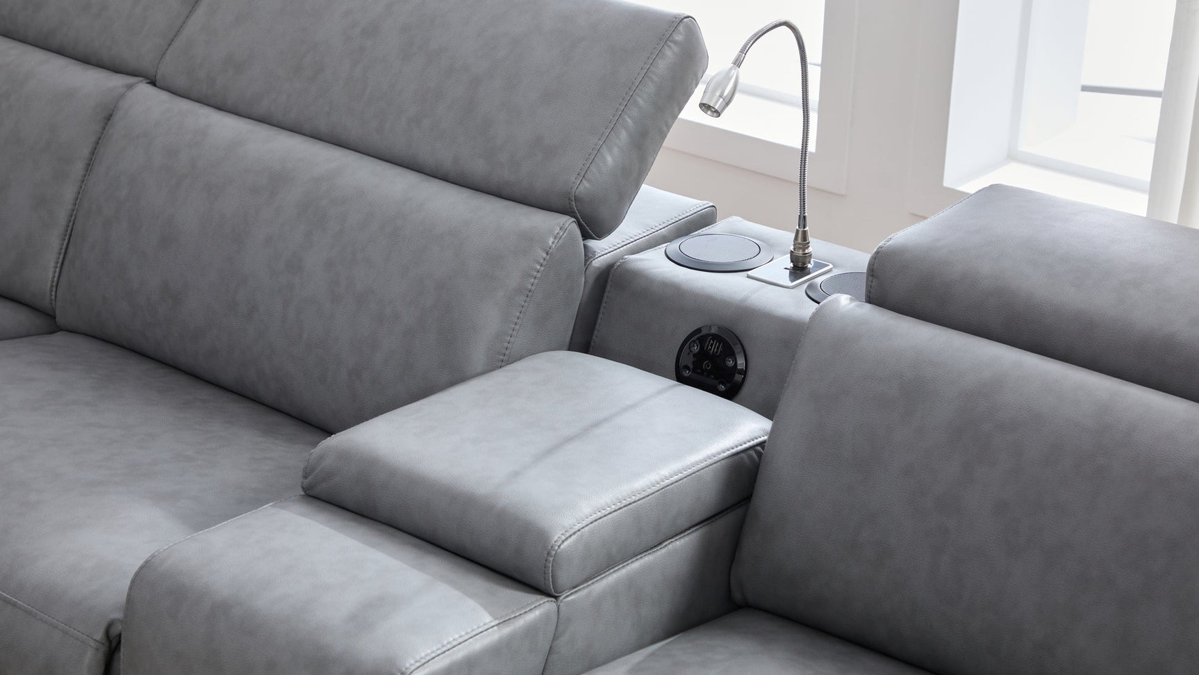 Bluetooth speaker detail in Divani sectional