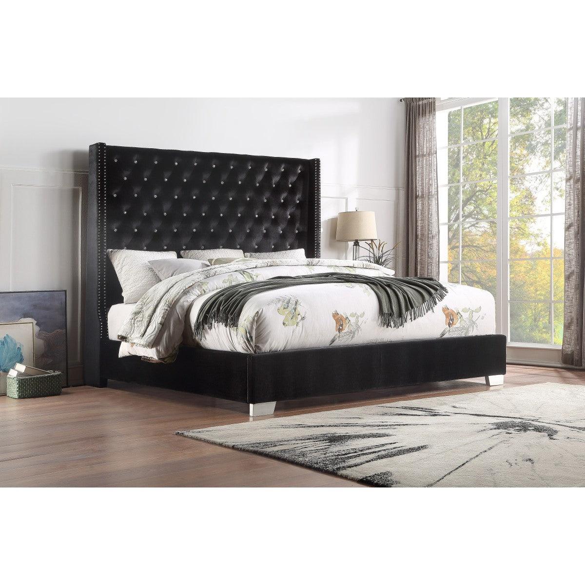 Close-up of tufted black faux leather headboard