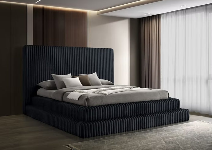 Side view of Micah Henley black upholstered platform bed