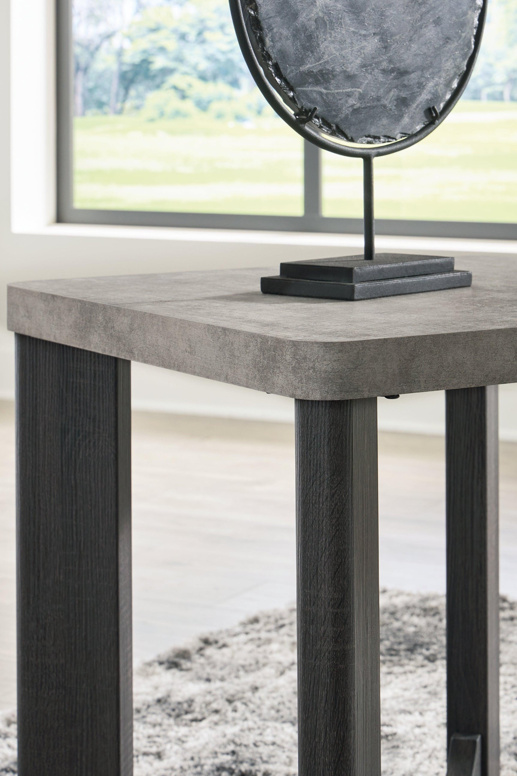 Close-up of Sharstorm end table leg and cross stretcher design