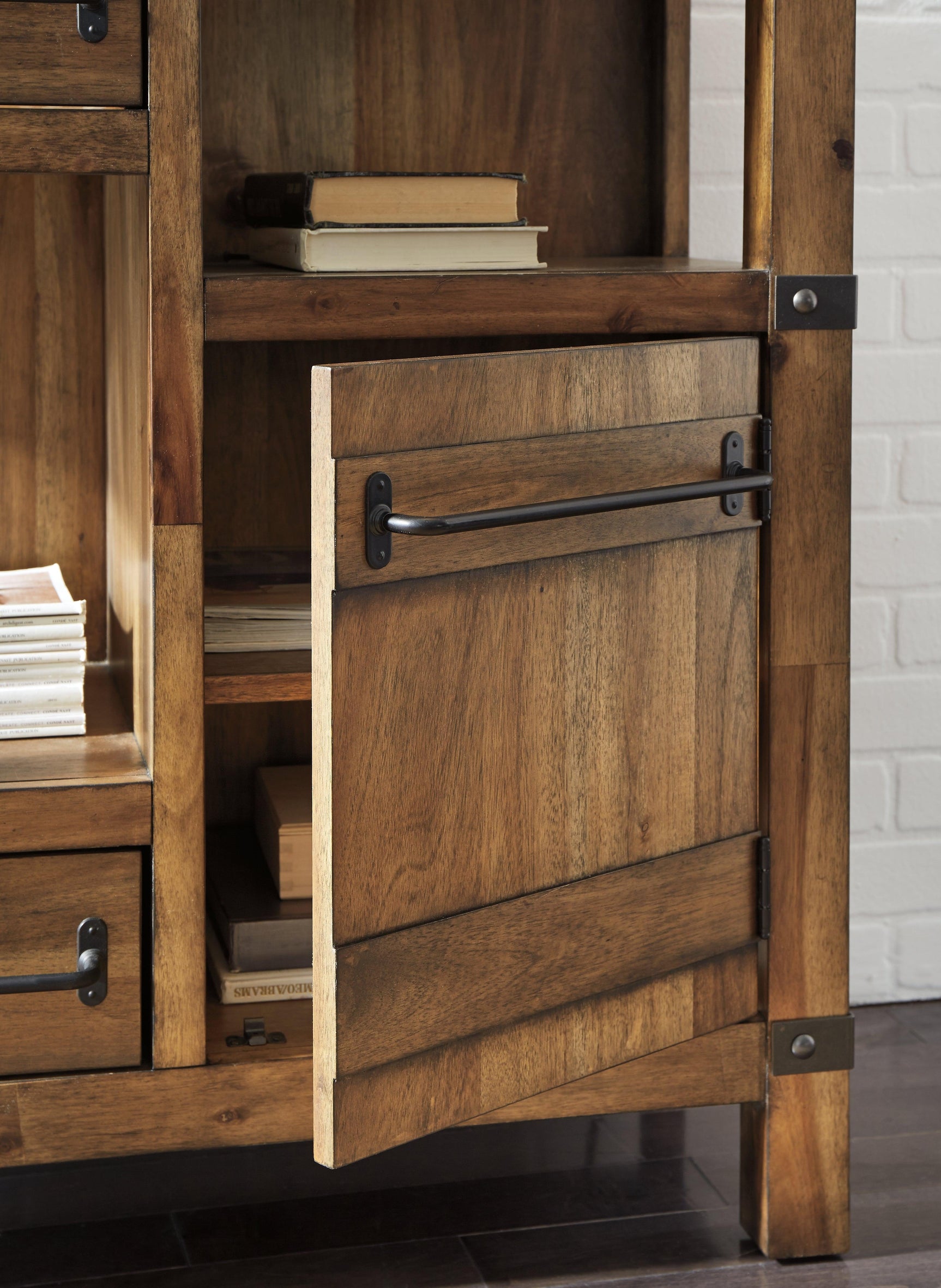 Close-up of bronze hardware and inlay detail on Roybeck Accent Cabinet