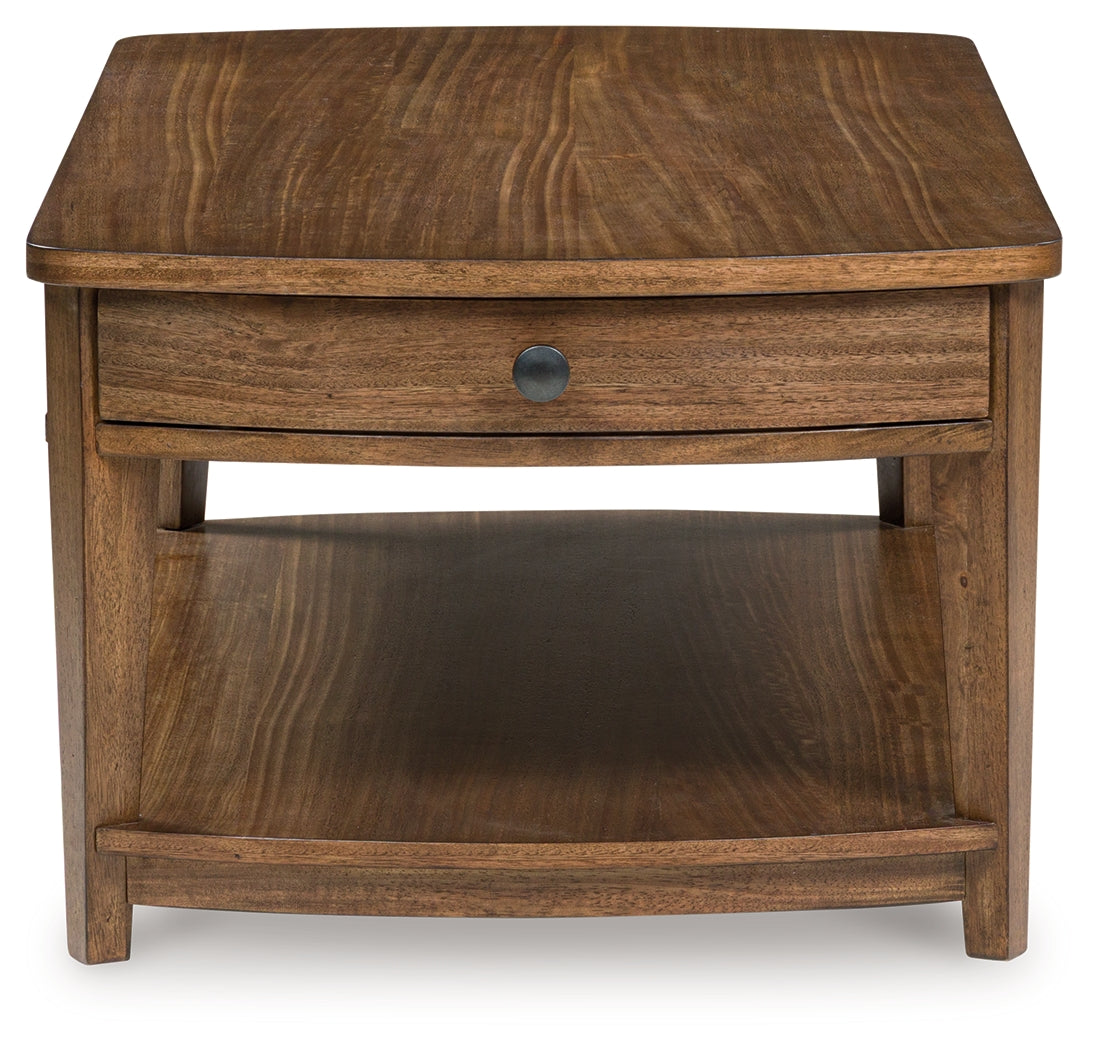 Lower shelf of Burkbyer Coffee Table with decorative items