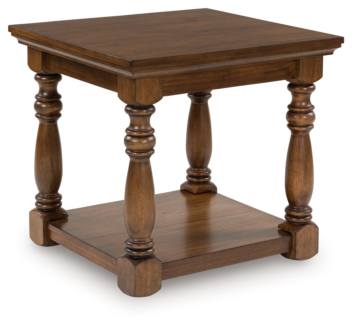 Sturlayne brown rectangular end table angled view showing leg details