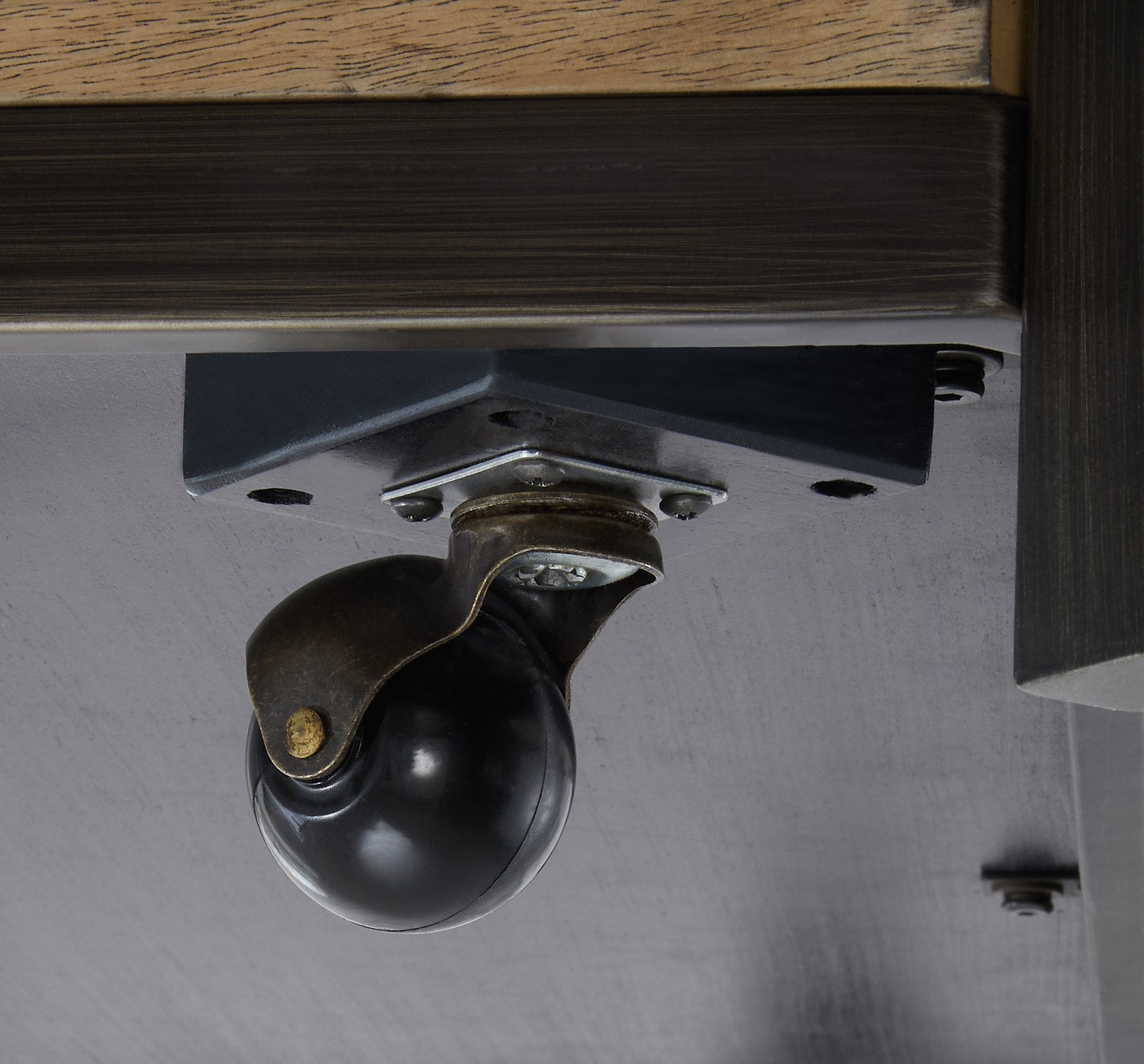 Caster detail on Montia Coffee Table showcasing mobility feature