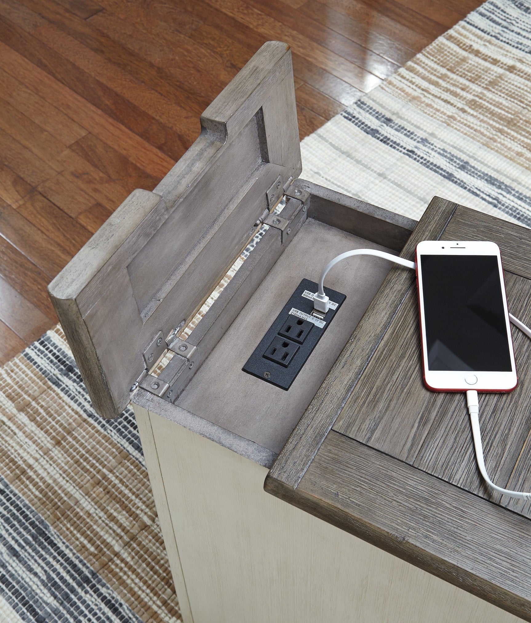 Close-up of pull-out tray and storage cabinet on Bolanburg end table