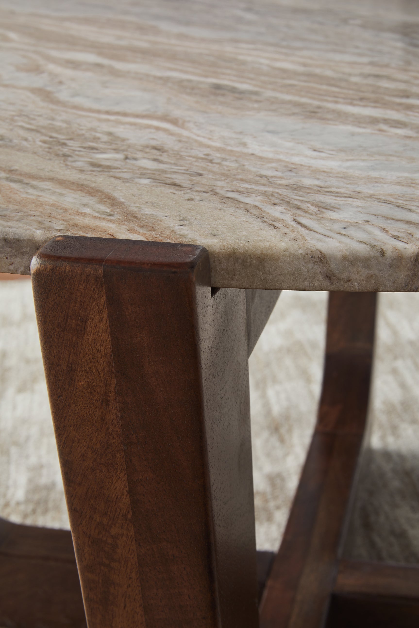Tanidore coffee table showing angled legs and warm brown wood finish