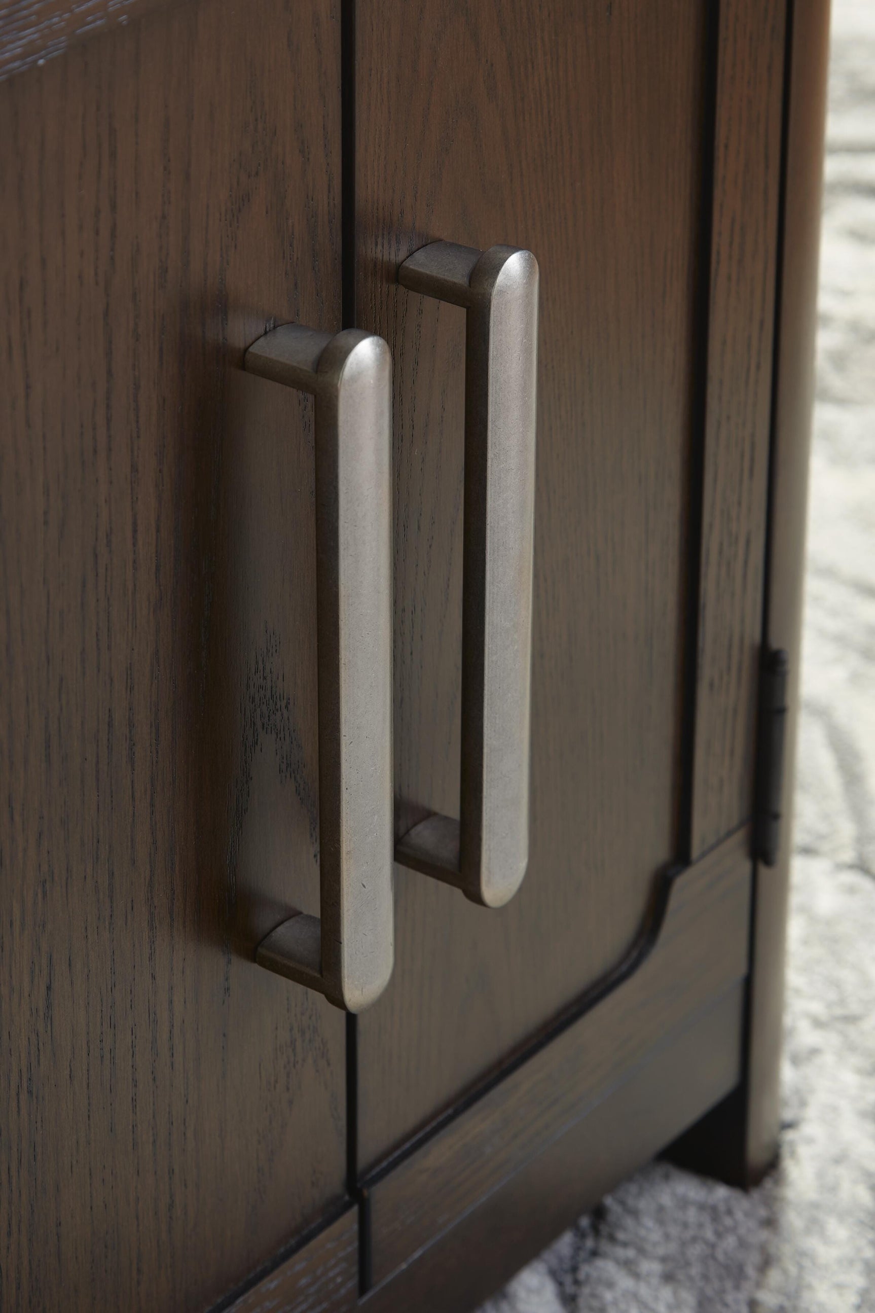 Close-up of metal aged pewter-tone door handle