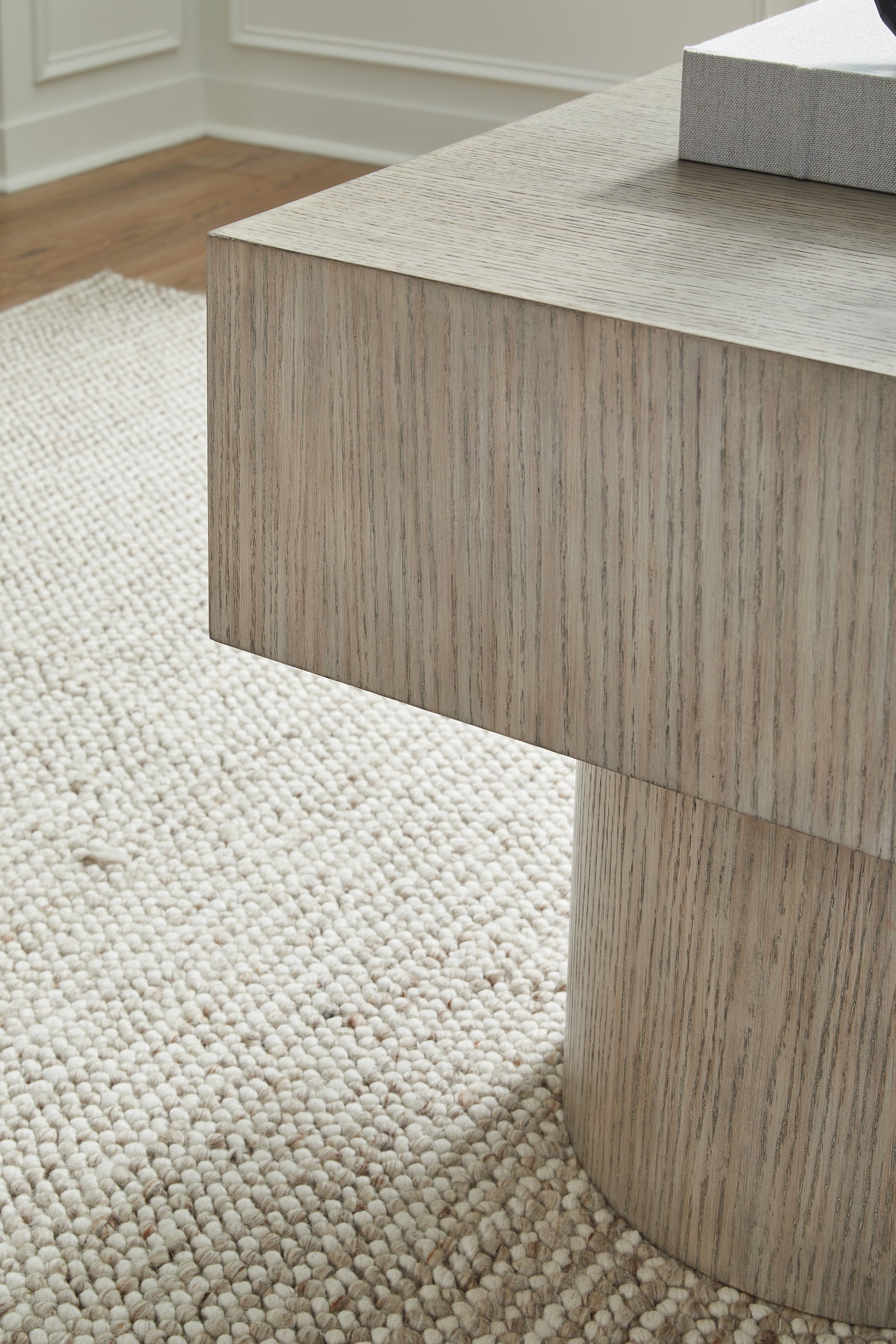 Jorielyn end table side view with light grayish brown layered finish