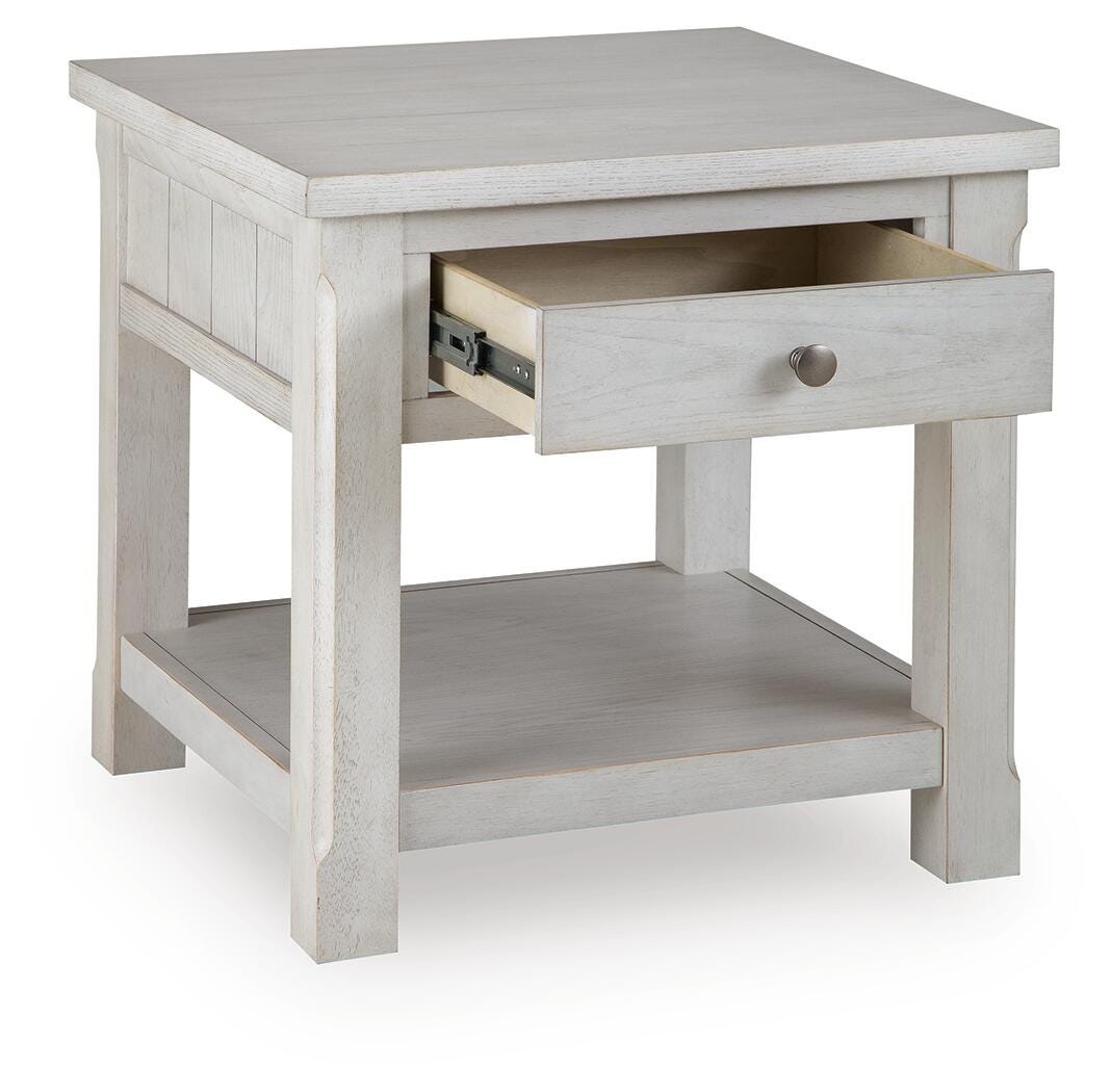 Robbinsdale Antique White End Table angled view
