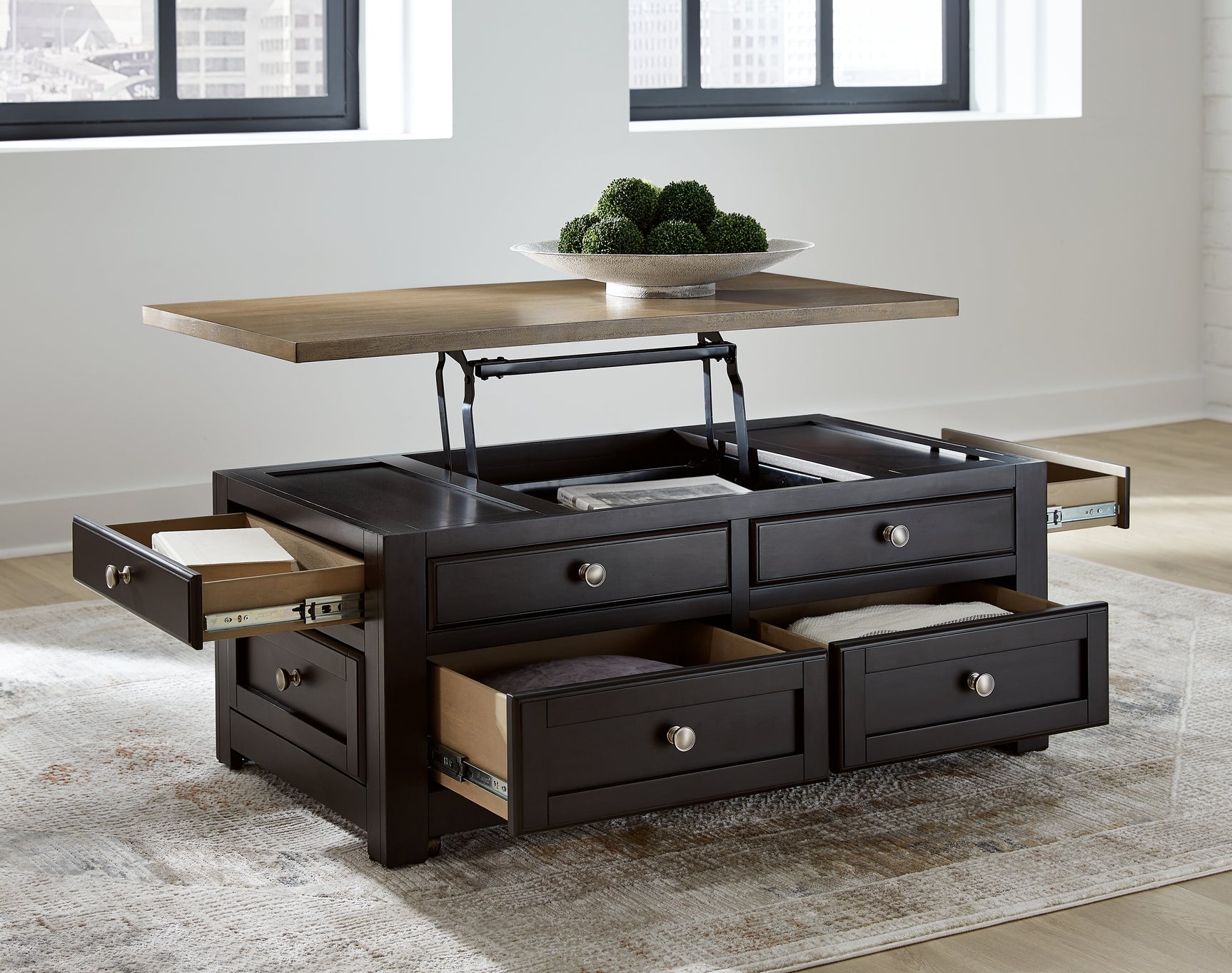 Drazmine Lift-Top Coffee Table open with visible storage drawers