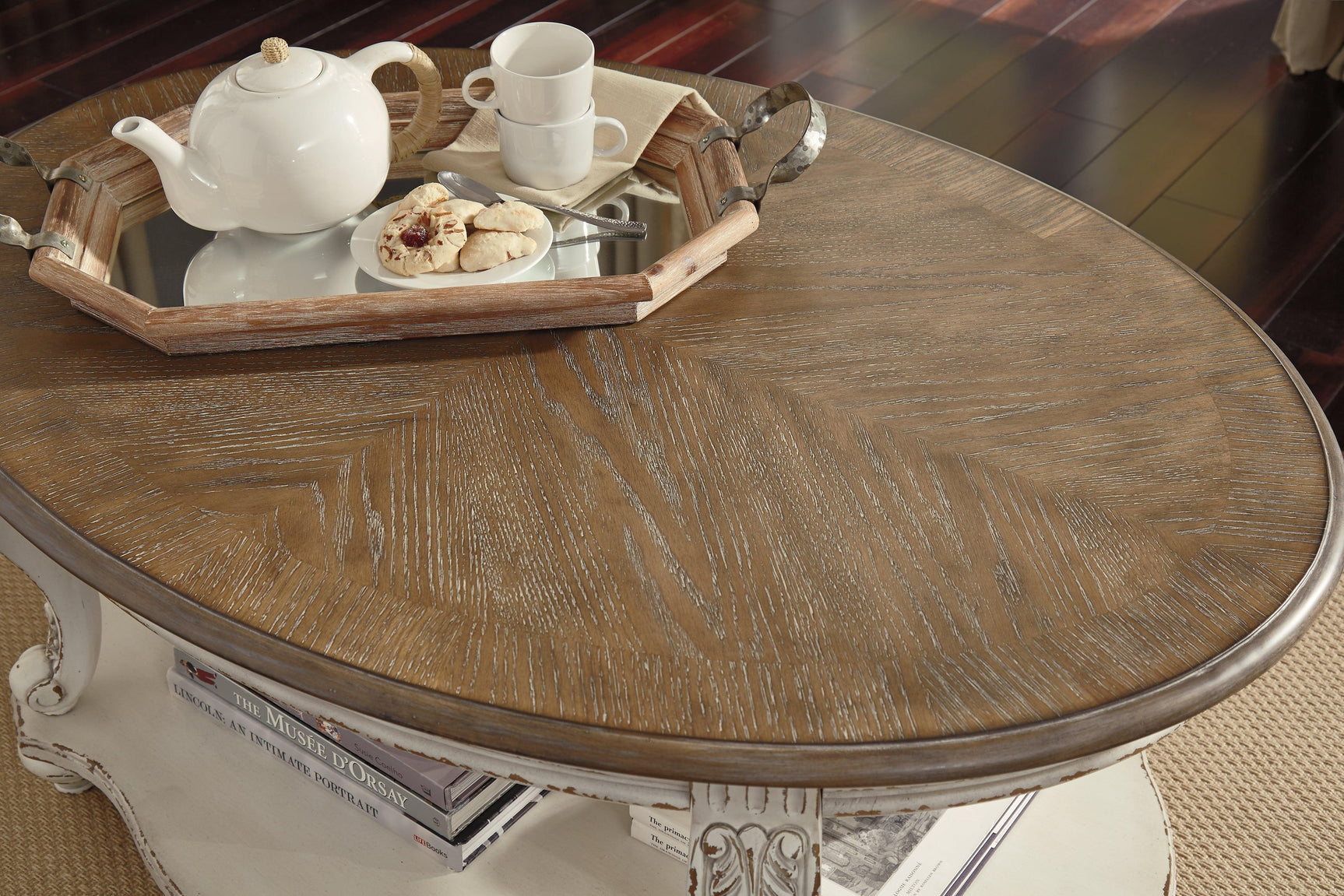 Realyn Oval White Brown Coffee Table top surface