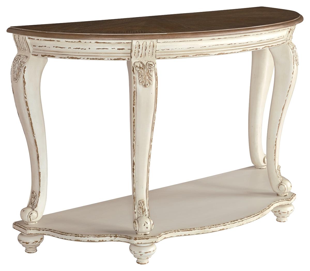 Realyn sofa table side view showing cabriole leg and drawer