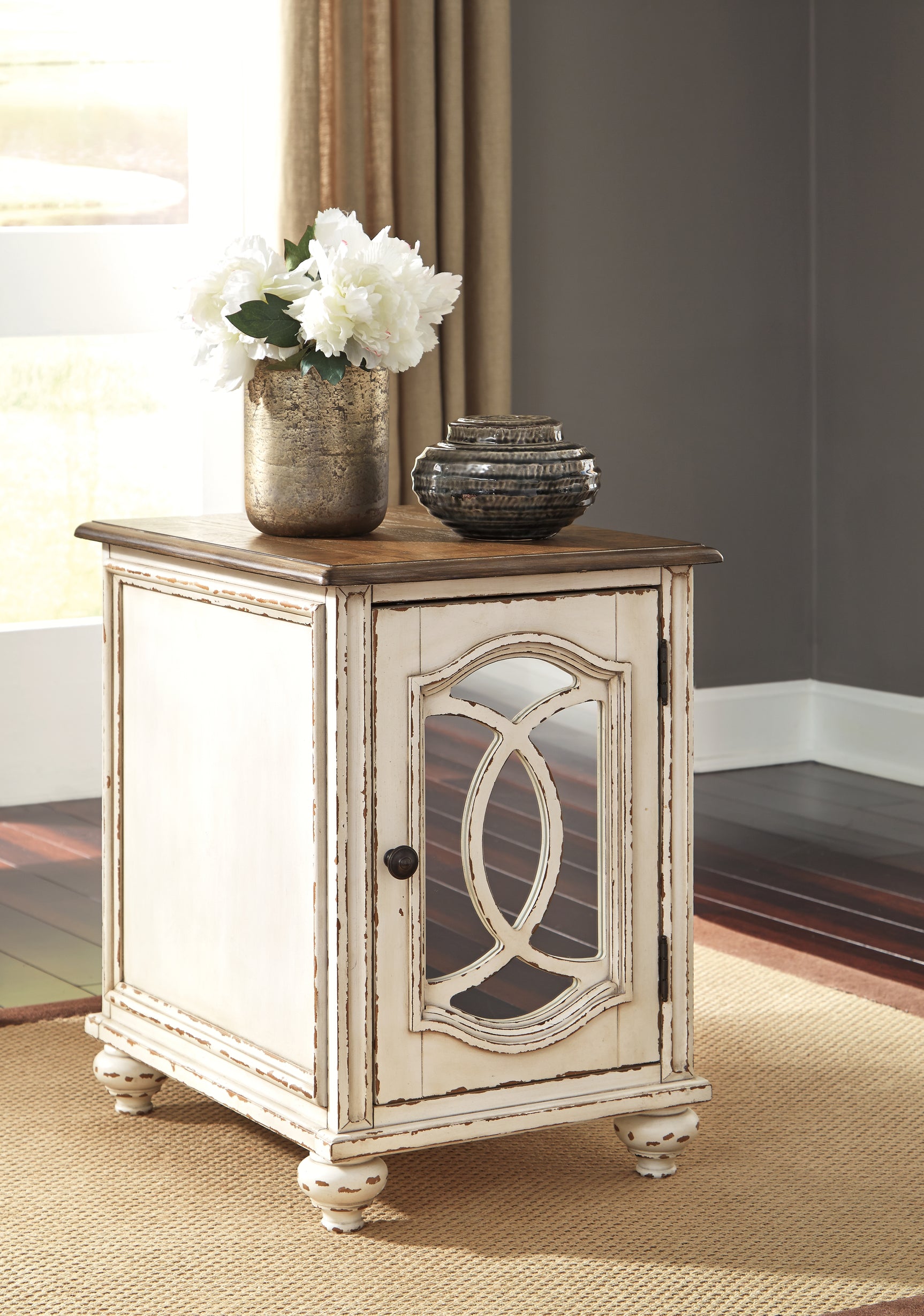 Angle view of one Realyn end table illustrating classic cottage style