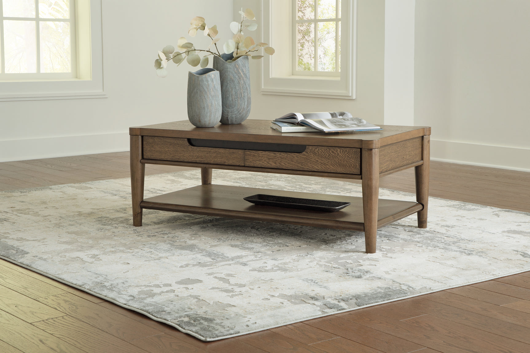 Roanhowe brown coffee table with two end tables set