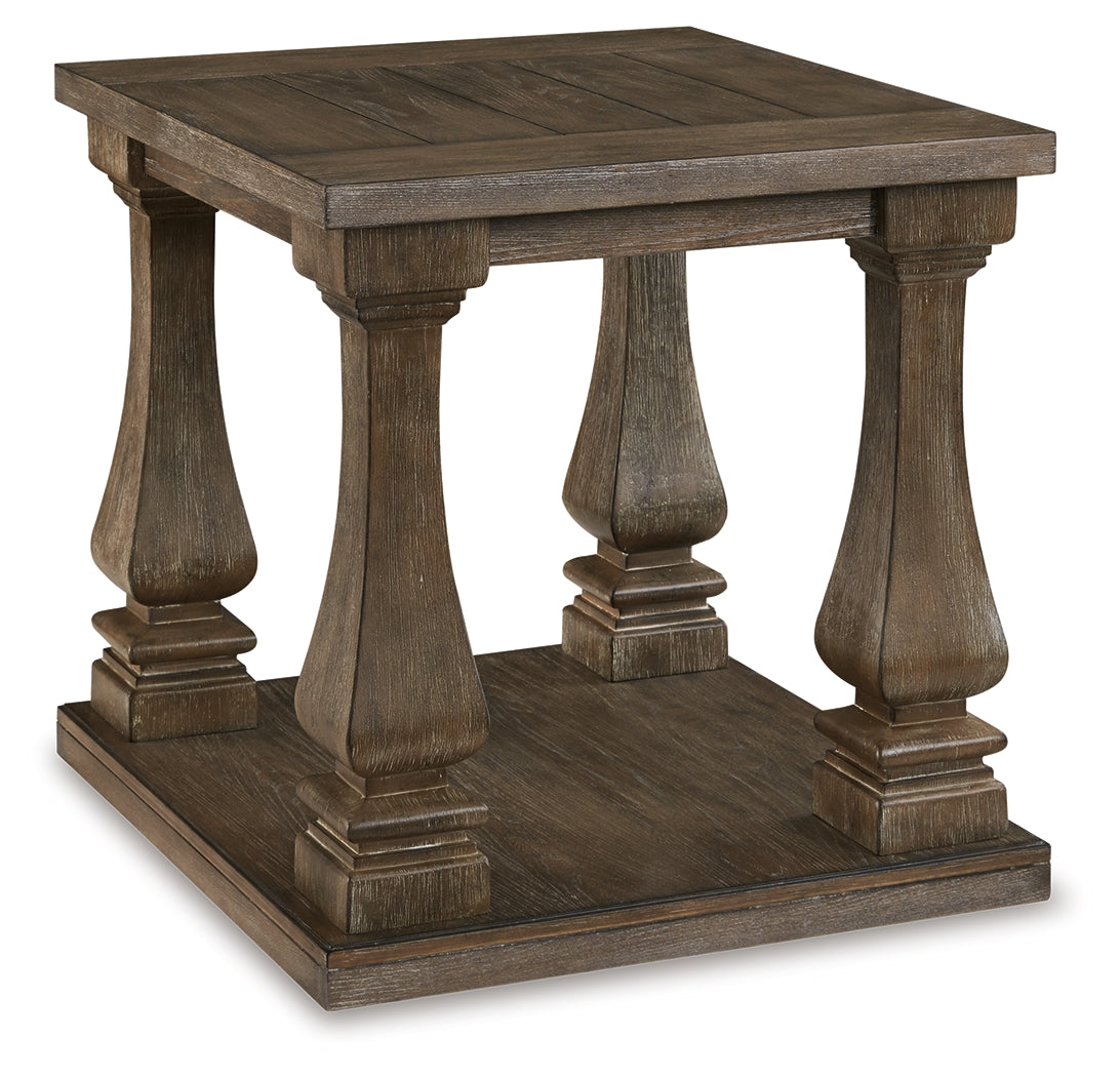 Angled view of Johnelle coffee table with distressed gray finish