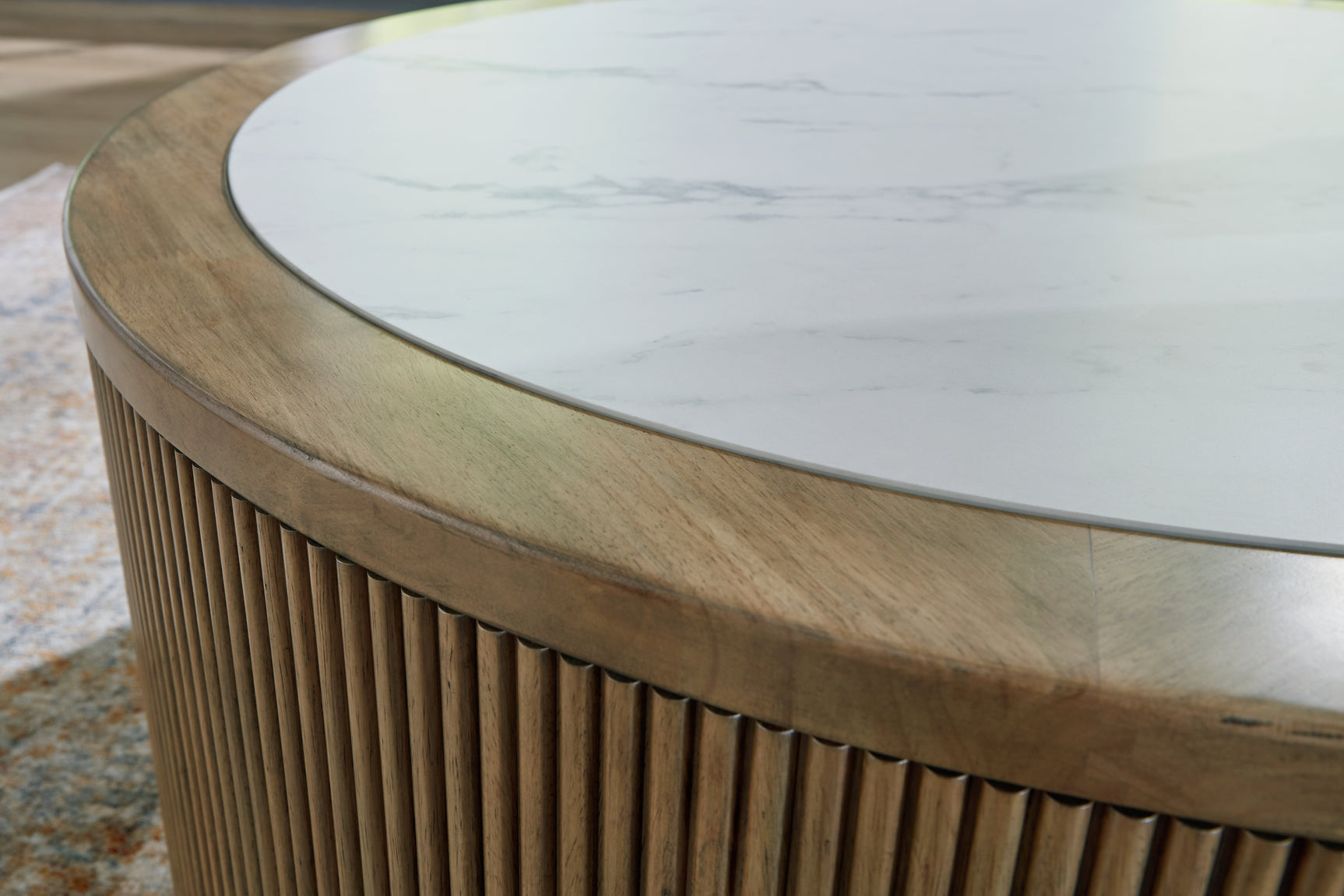Close-up of light brown reeded base detail