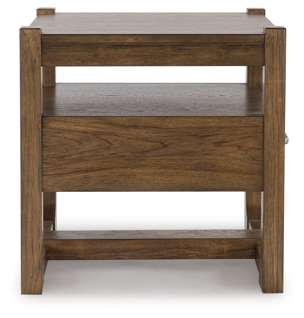 Cabalynn light brown coffee table with two end tables from front angle