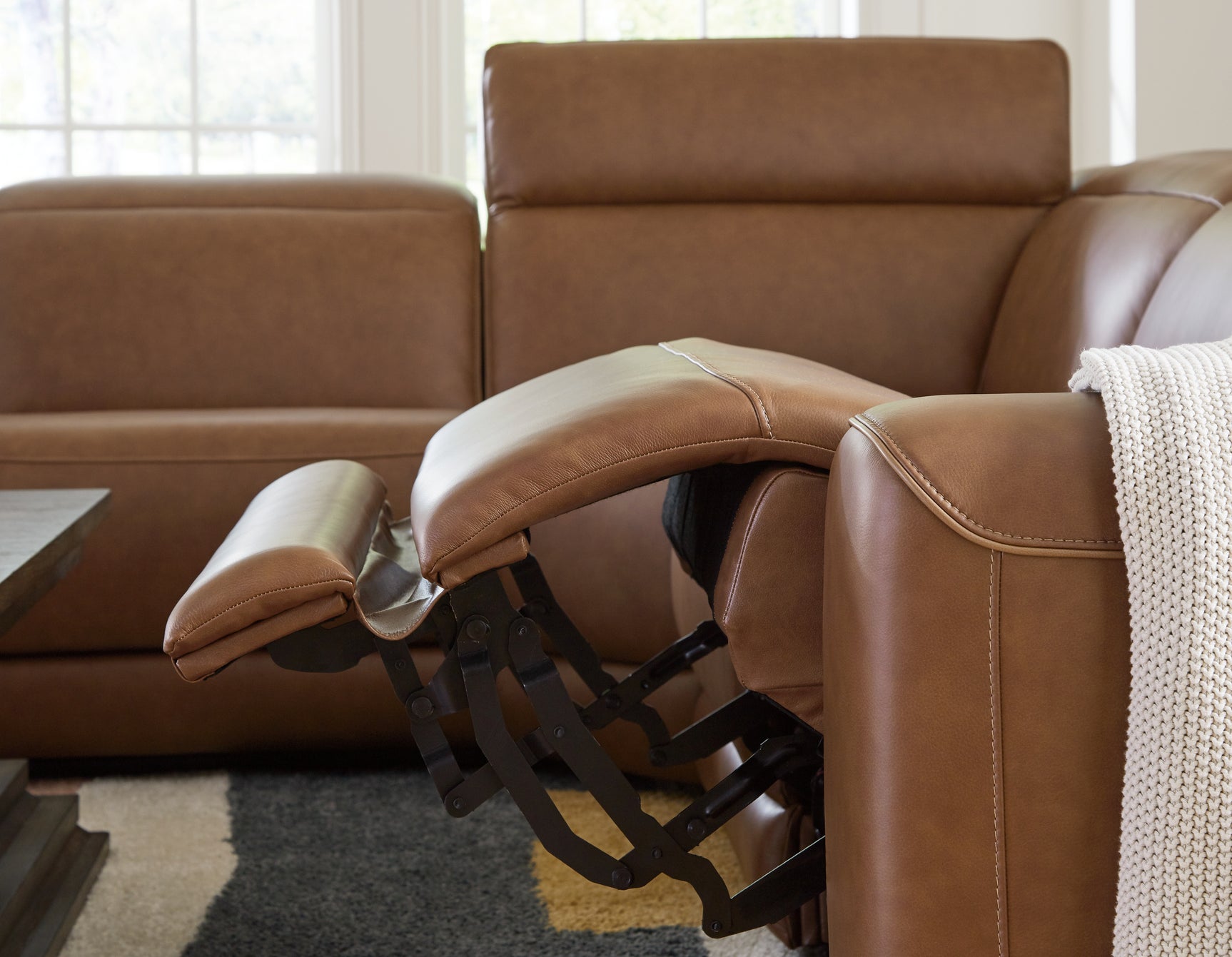 Extended ottoman with power footrest