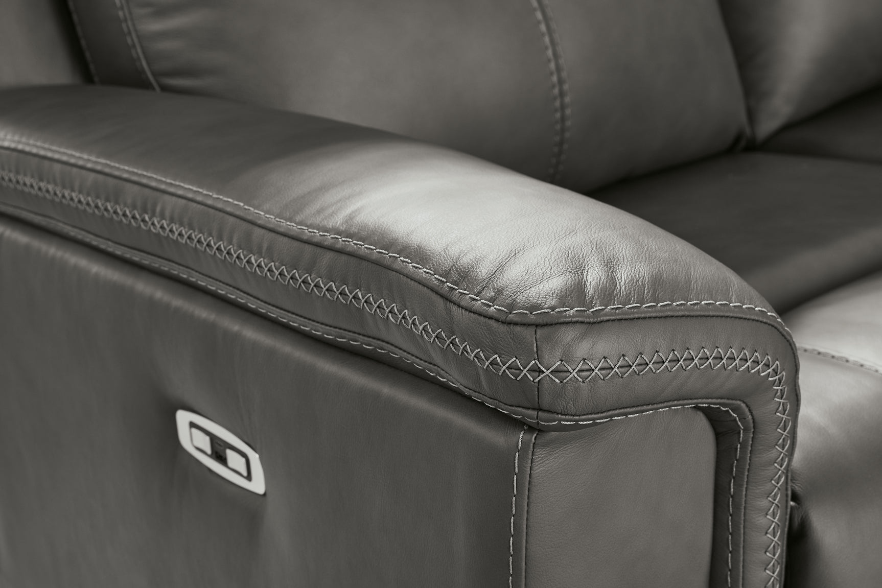 Close-up of leather and stitching detail on recliner