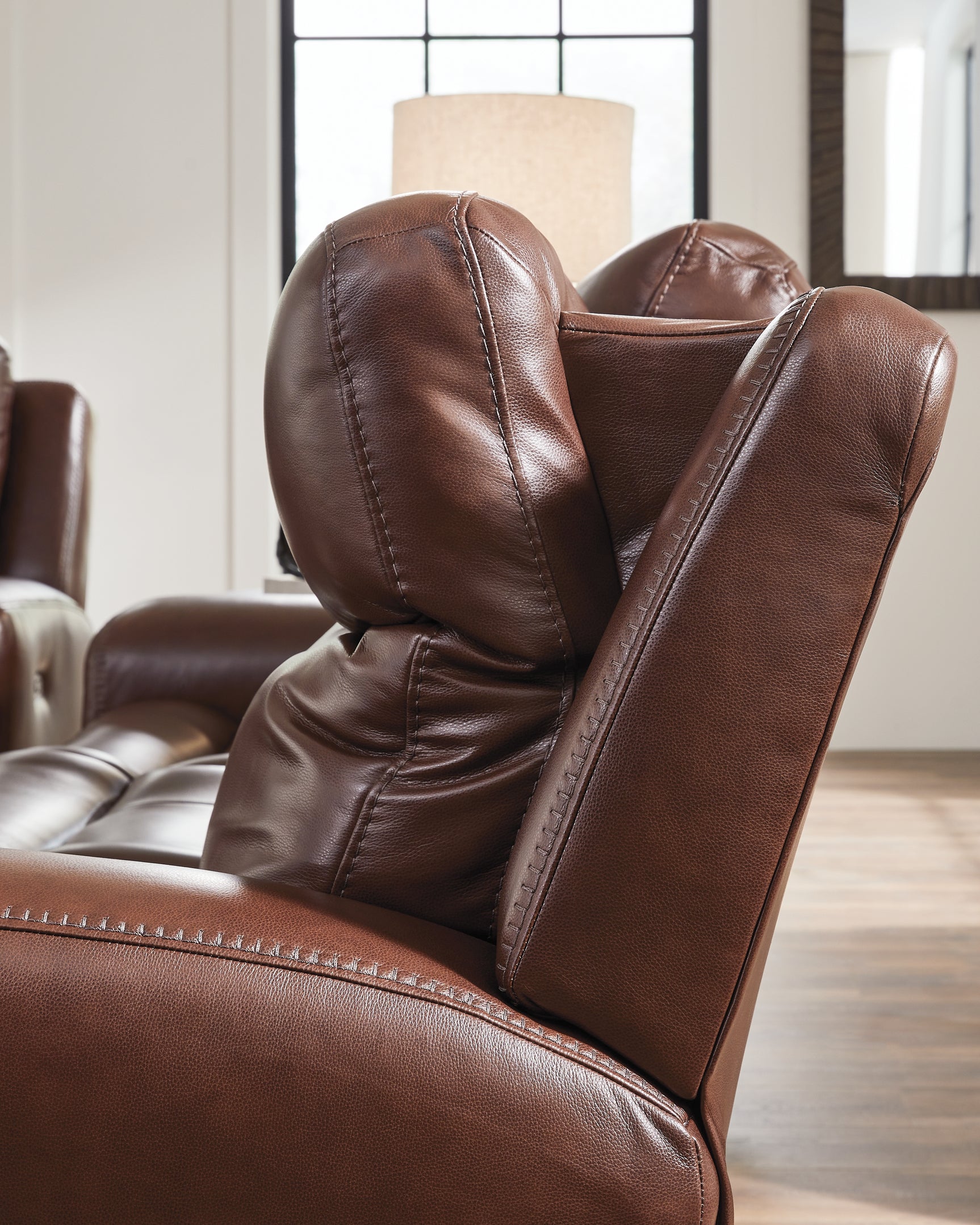 Close-up of stitching on sofa backrest