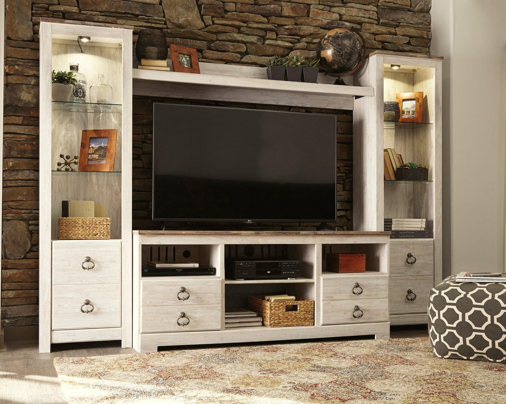 Close-up of whitewashed finish and brass-tone hardware