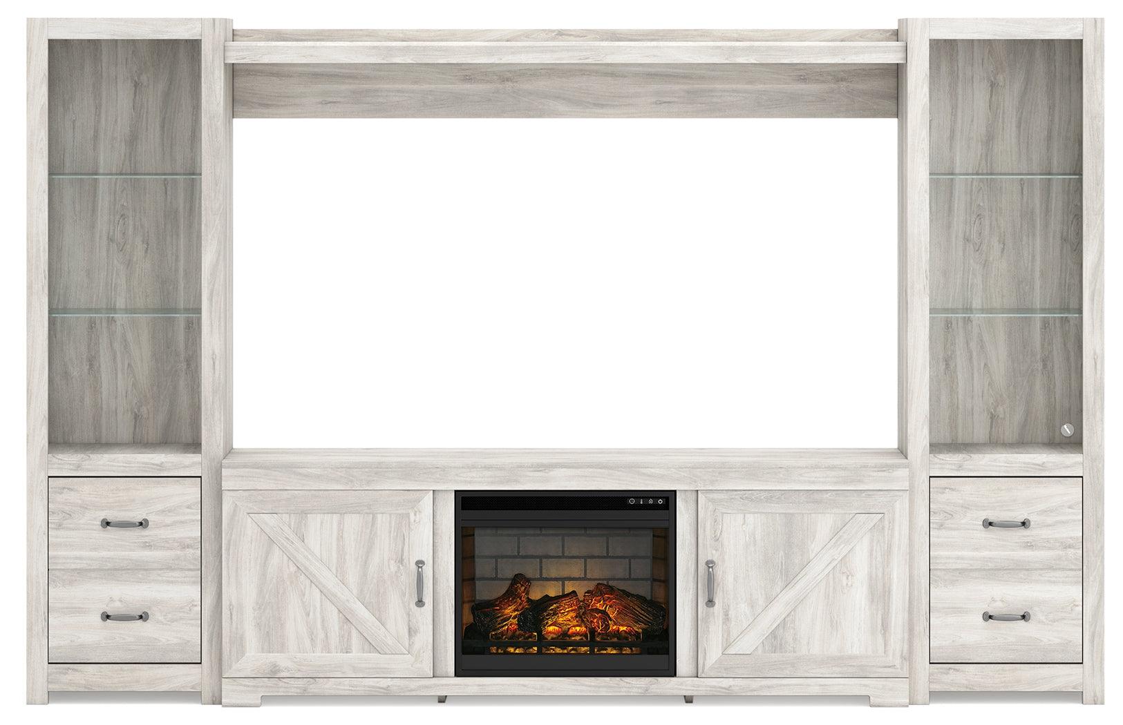 Bellaby 4-piece entertainment center illuminated with fireplace glow