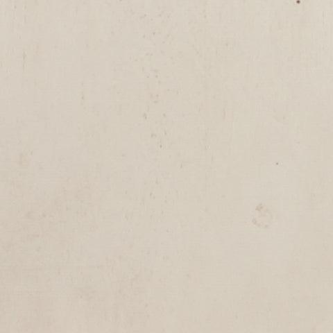 Close-up of distressed wood top and chipped white finish on Realyn TV stand