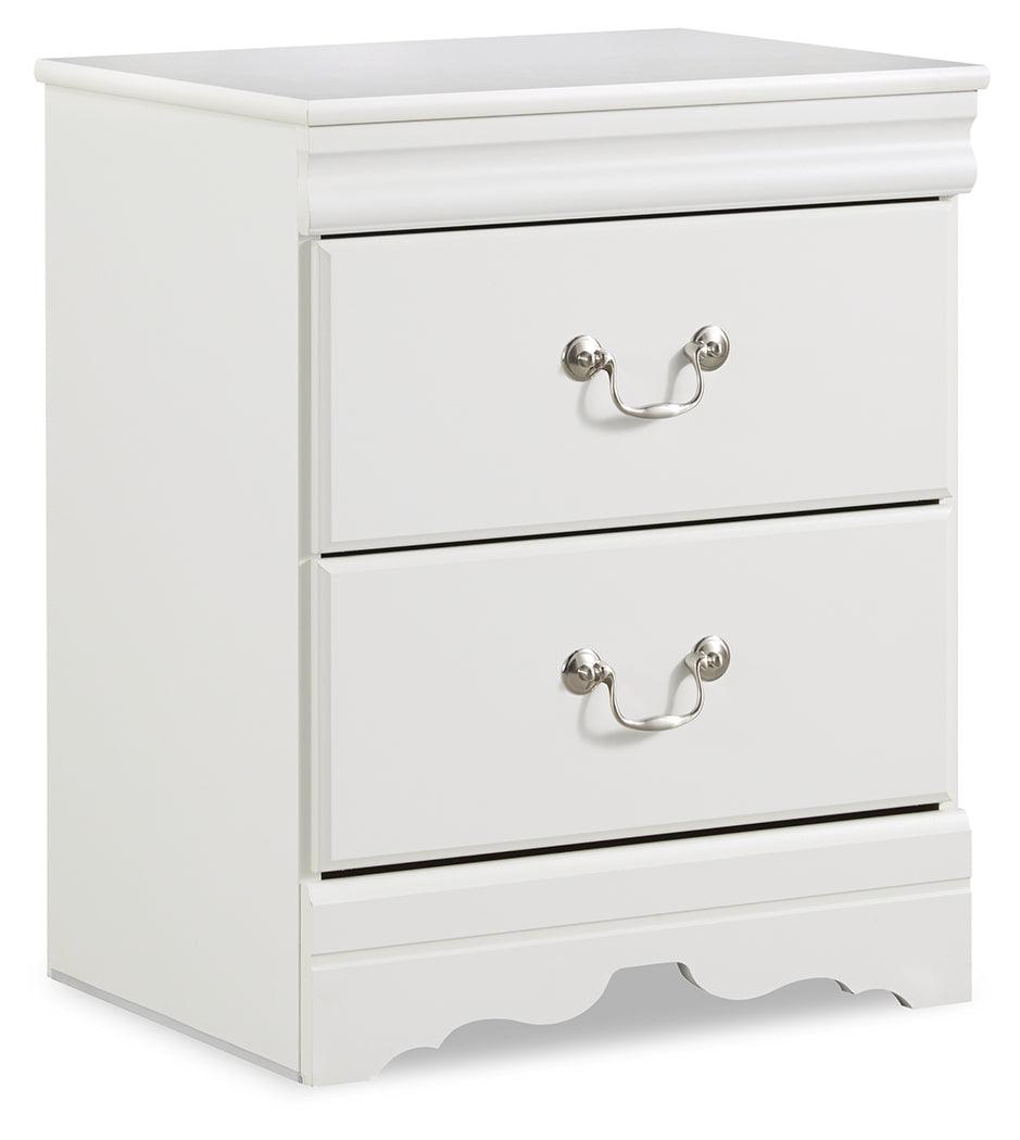 side view of white sleigh bed