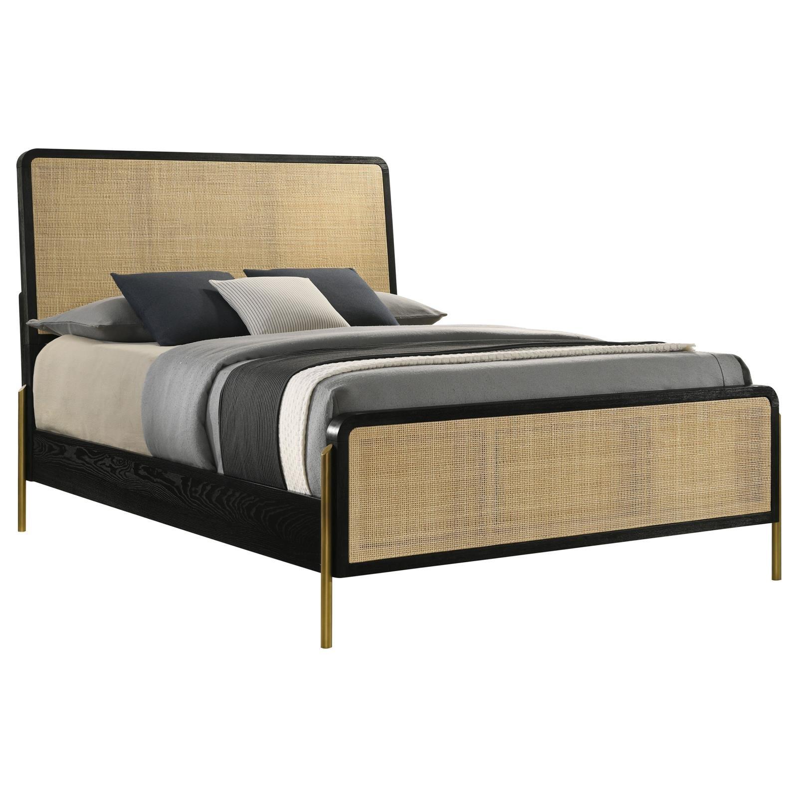 Angled side view showing slender muted gold legs of Arini Eastern King Bed