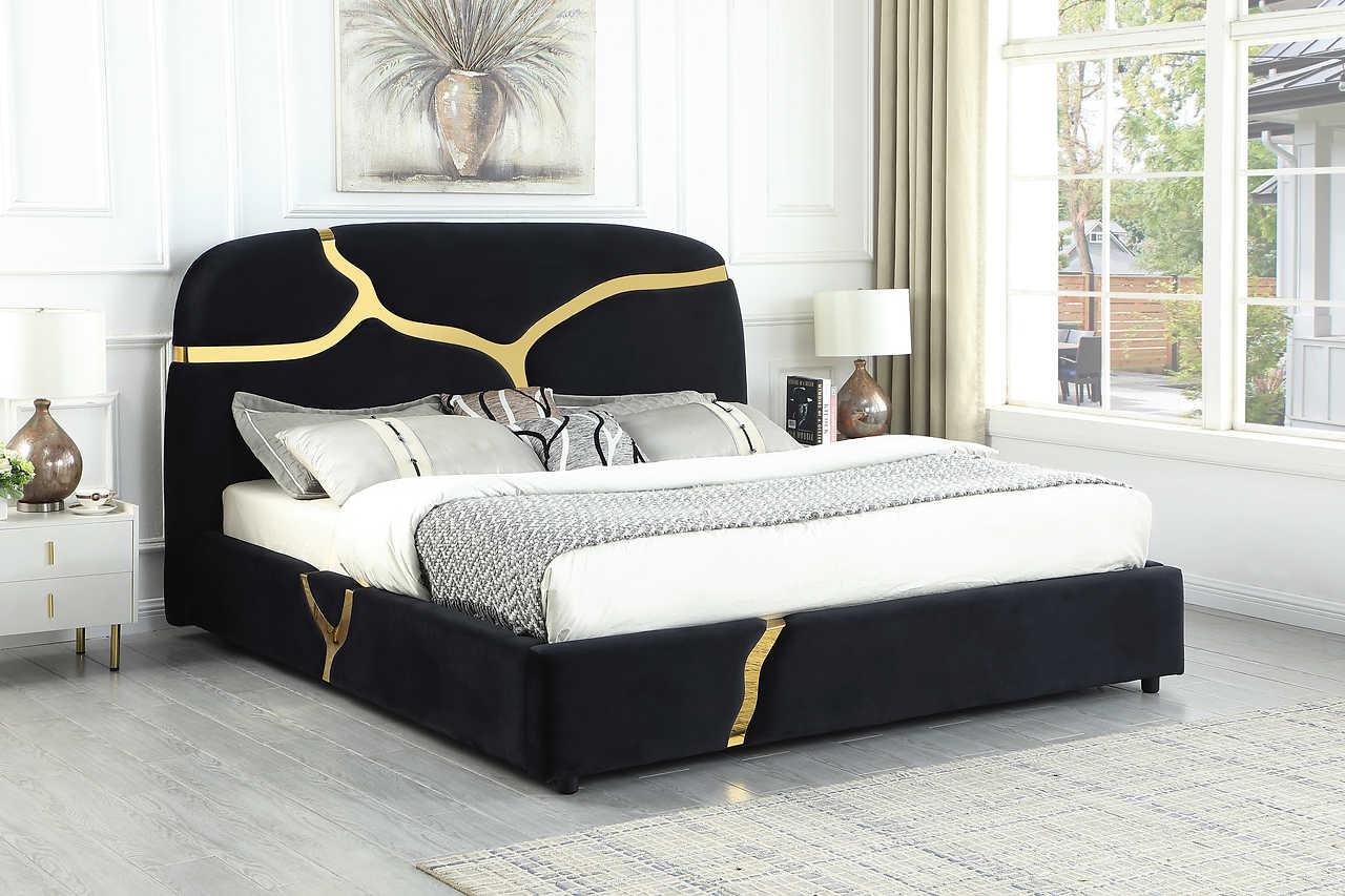 Side angle of Milan black velvet queen bed with gold accents