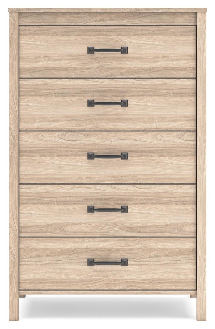 Battelle Tan Chest of Drawers in bedroom setting