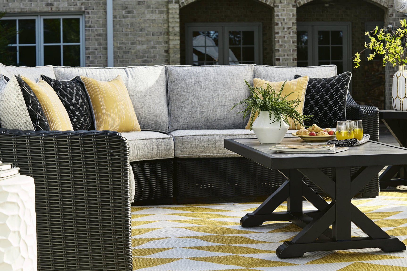 Beachcroft outdoor coffee table front view on outdoor setting