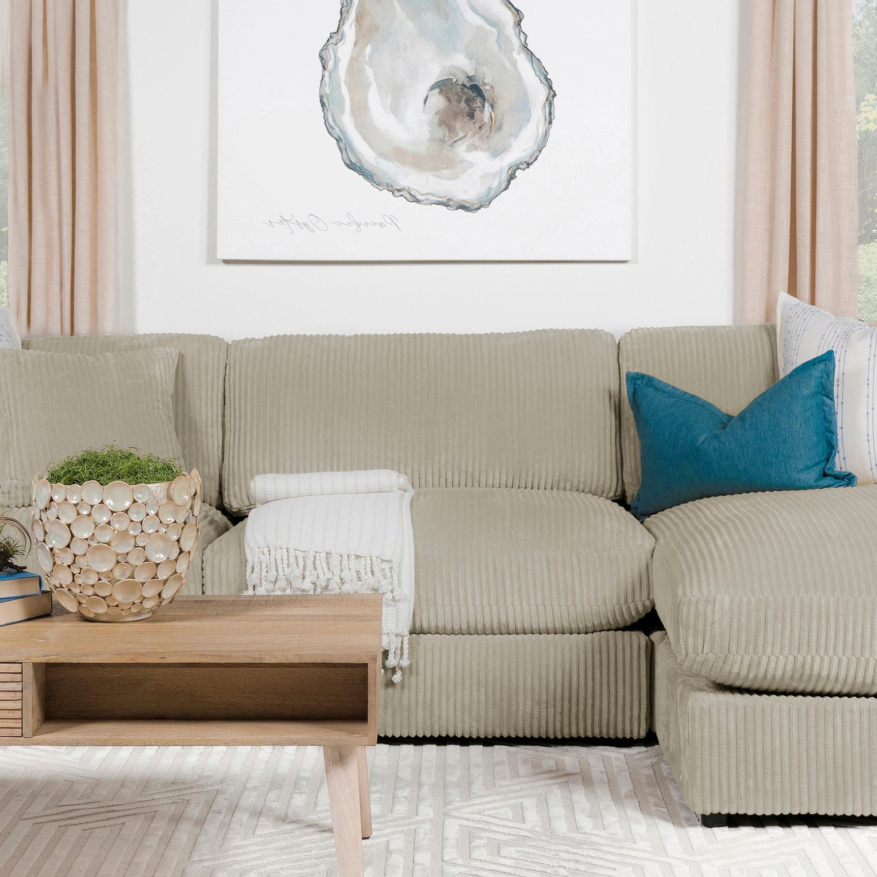 Side angle of Blaine Upholstered Armless Accent Chair in Sand