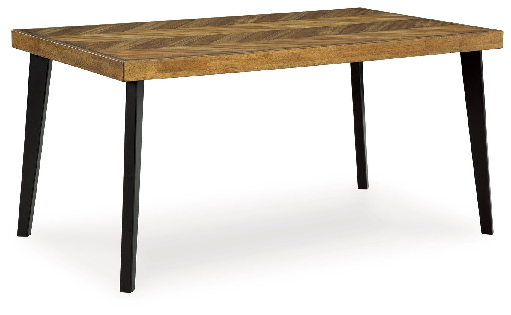 Side view of Blondon dining table and chairs with black tapered legs