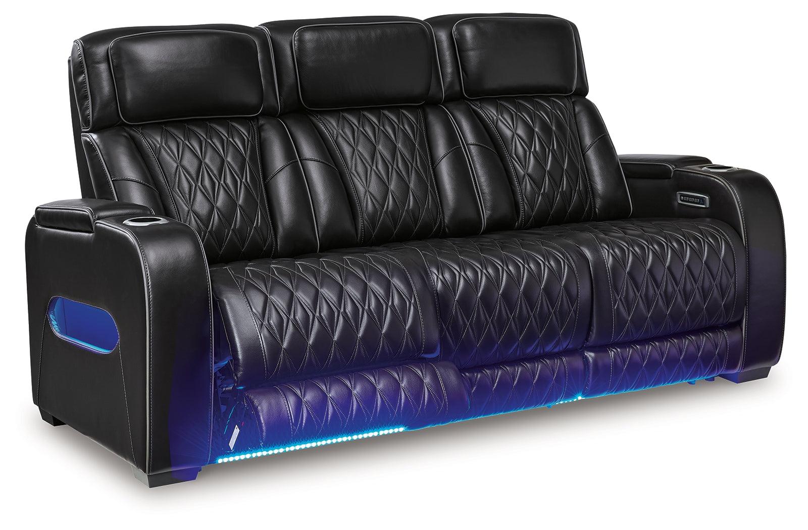 Boyington Black Leather Power Reclining Sofa center seat drop-down table with USB ports