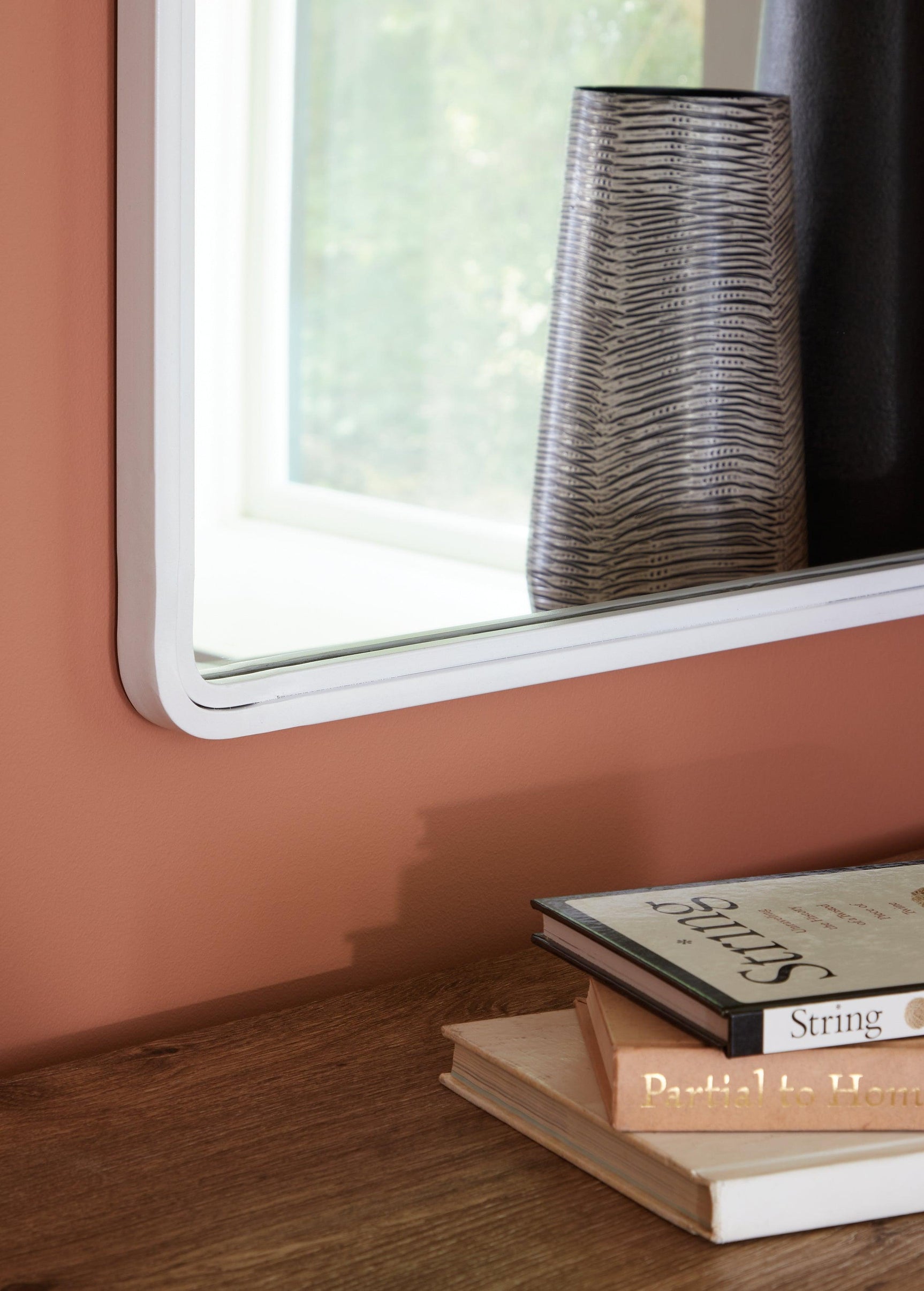 Brocky Mirror displayed above console table