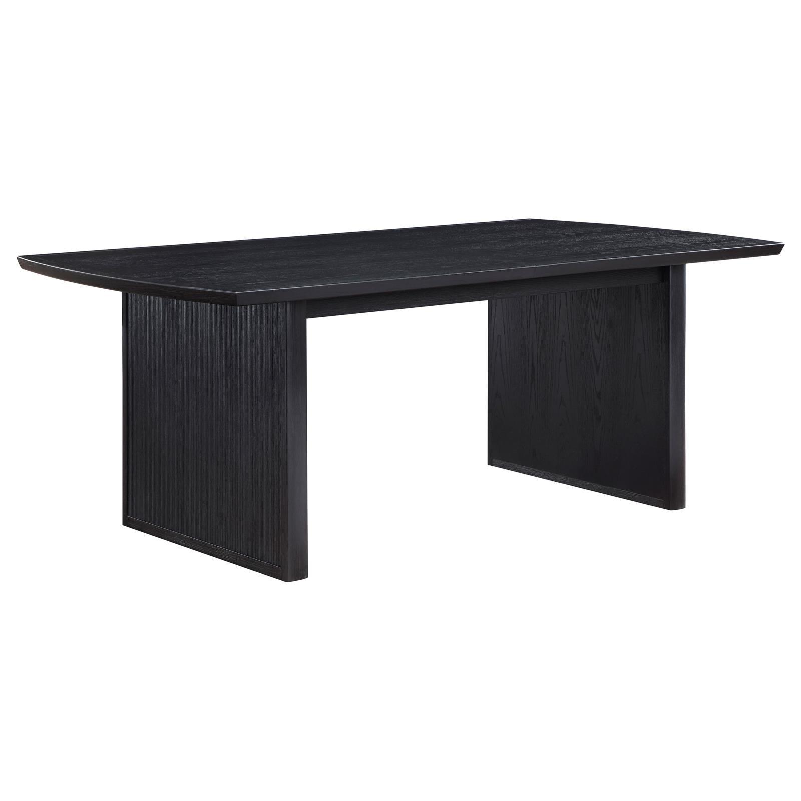 Close-up of wire-brushed distressed black wood finish on table surface