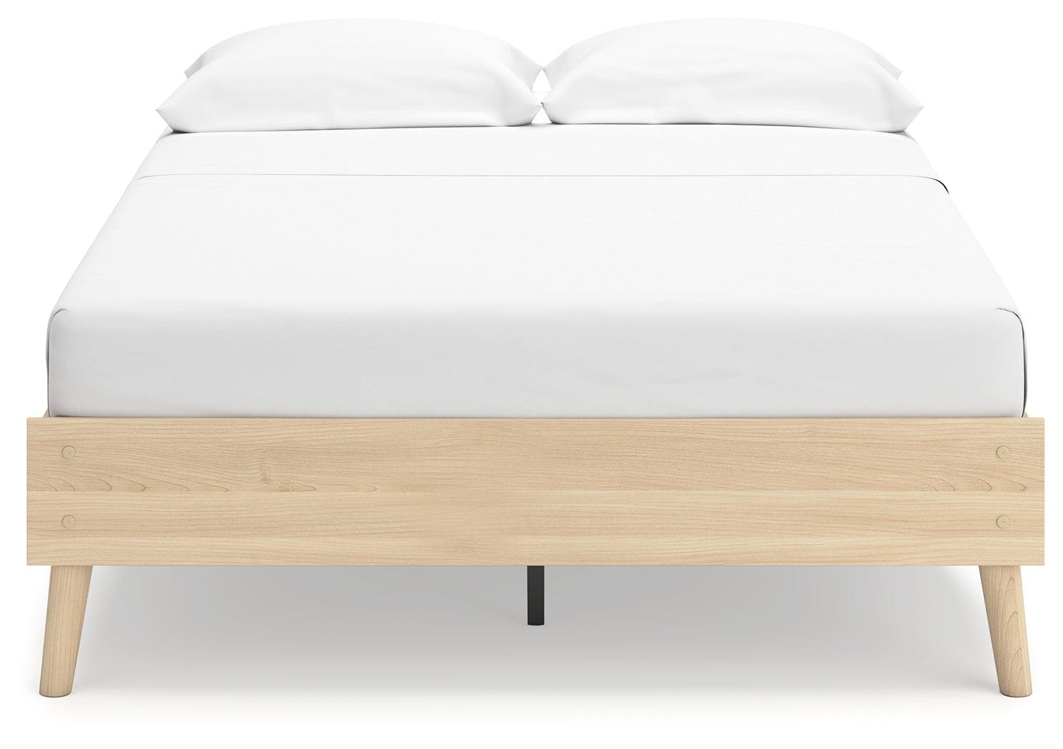 Bed frame footboard detail in tan ash laminate