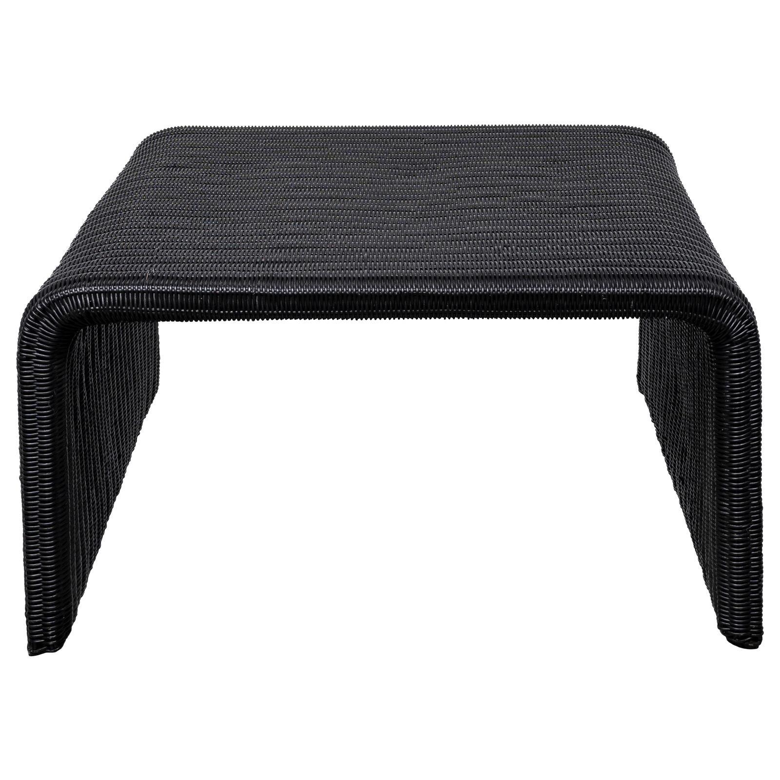 Close-up of black iron frame and woven rattan detail