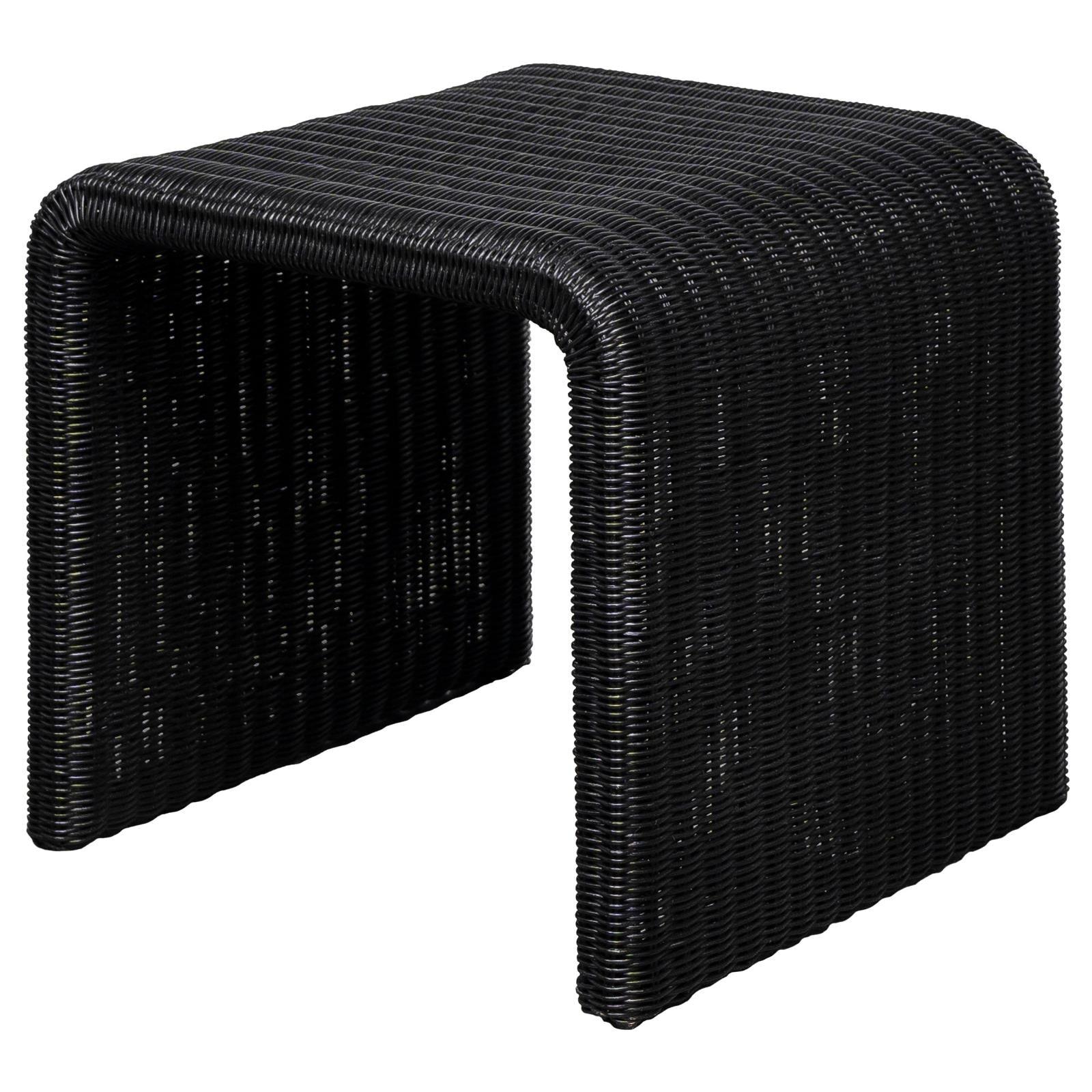 Black iron frame detail of Cahya woven rattan end table