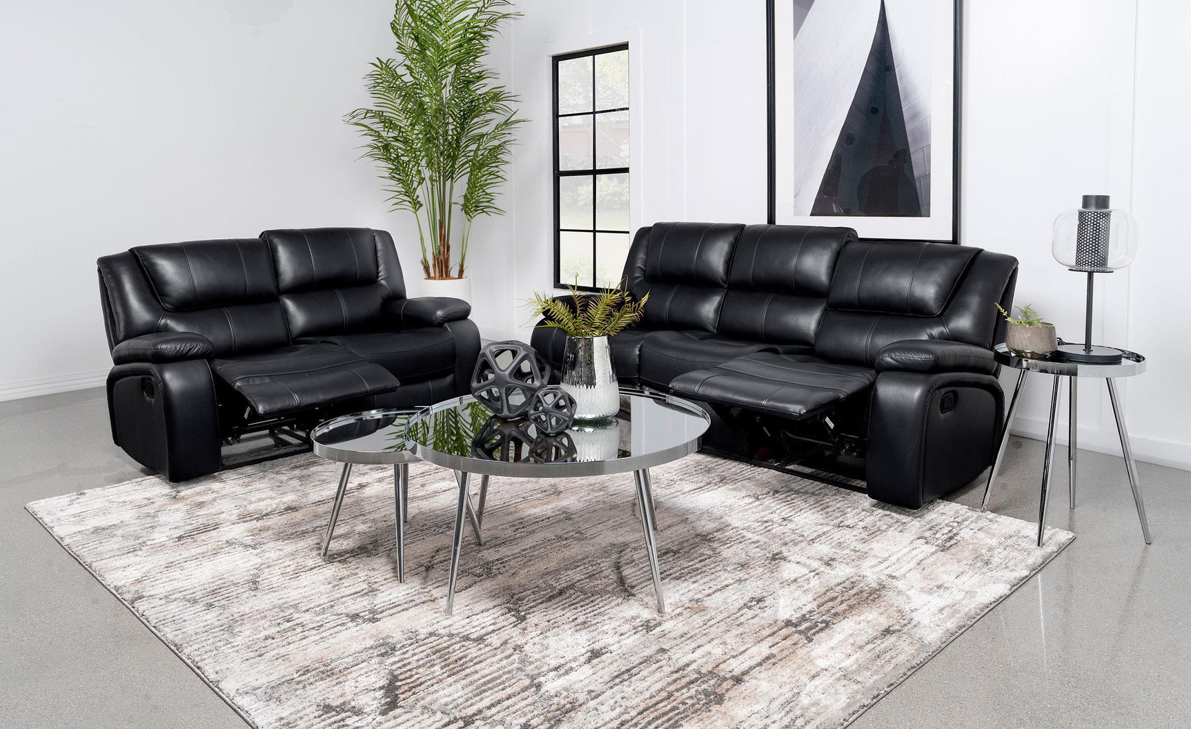 Camila reclining sofa angled side view showing armrest and reclining feature