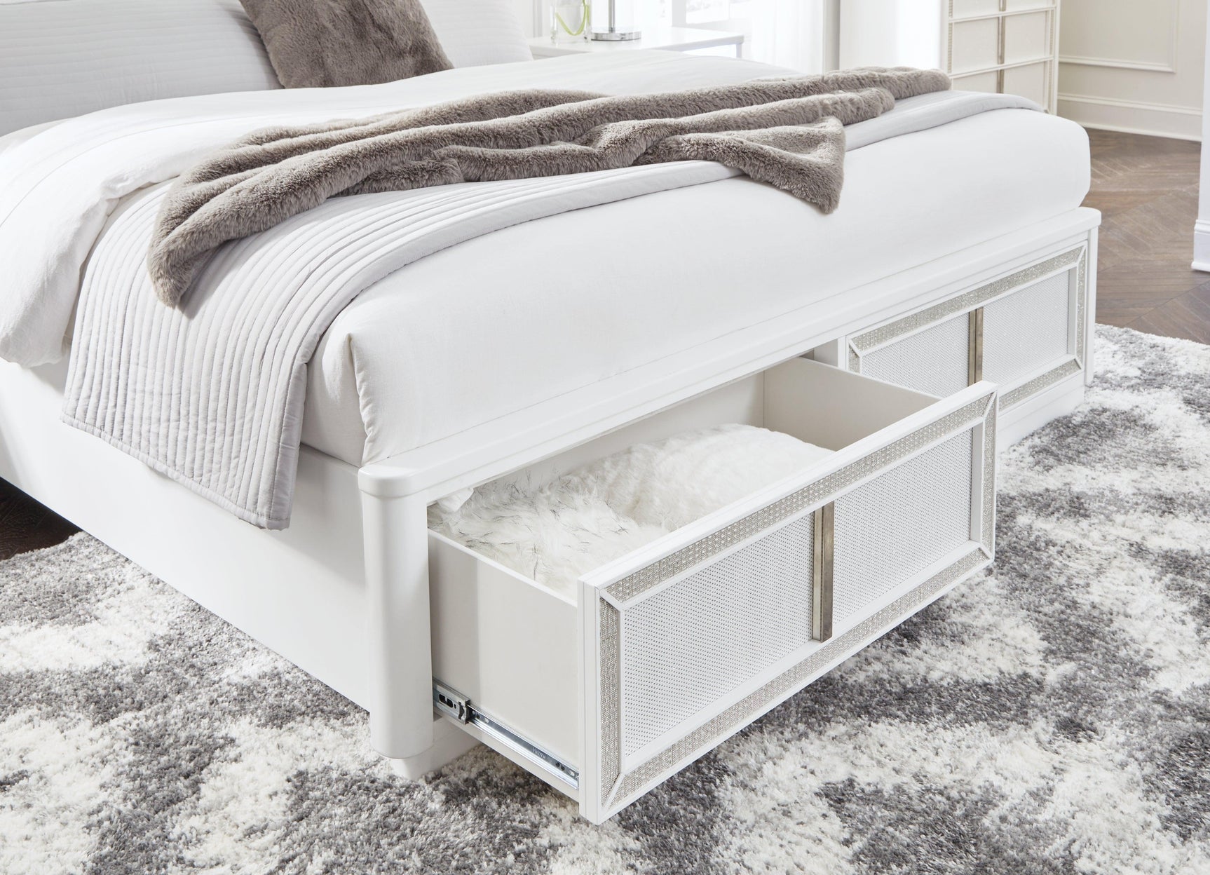 Rhinestone framed drawer front on king storage bed