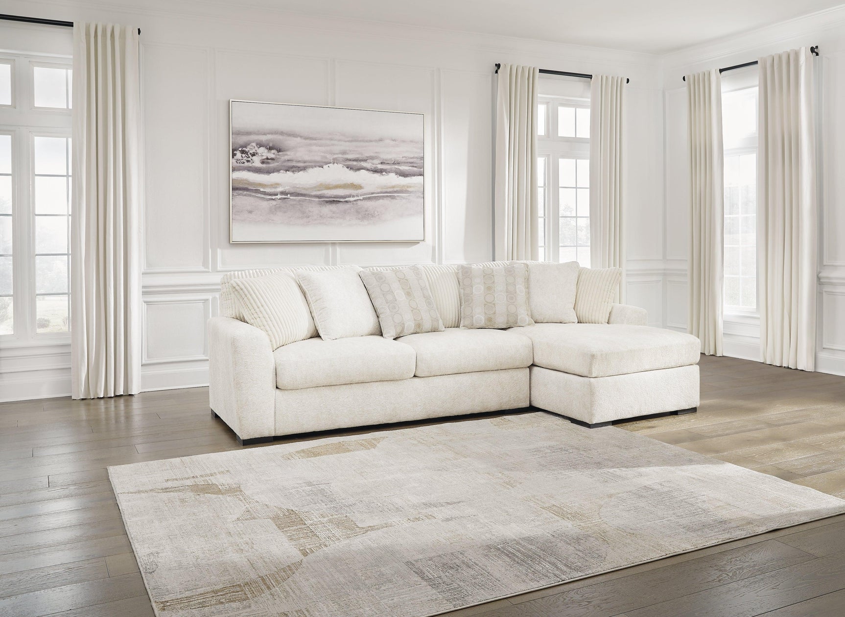 Room view of Chessington Ivory 2-Piece Sectional Sofa with Chaise in living space