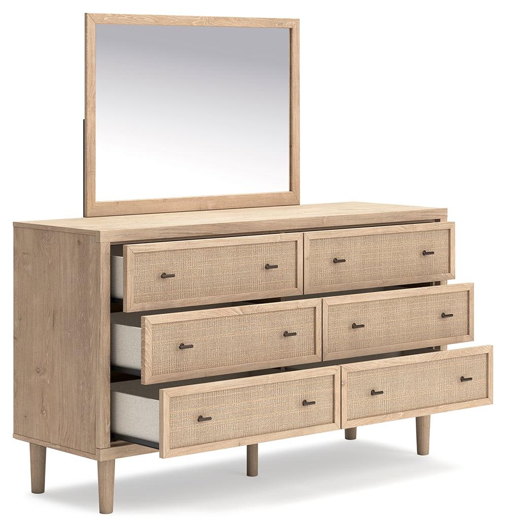 Close-up of bronze-tone knobs and drawer detail on Cielden dresser