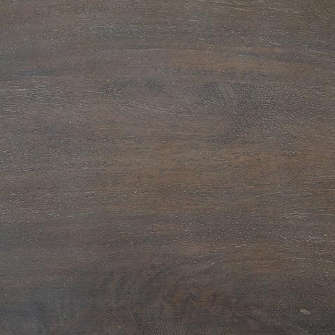 Cormmet accent table in living room setting with contemporary decor