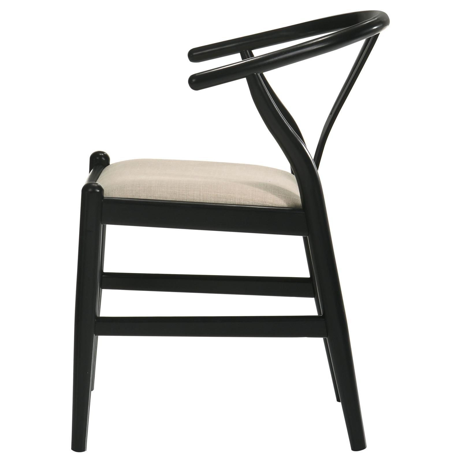 Detailed view of tapered wooden legs on dining side chair