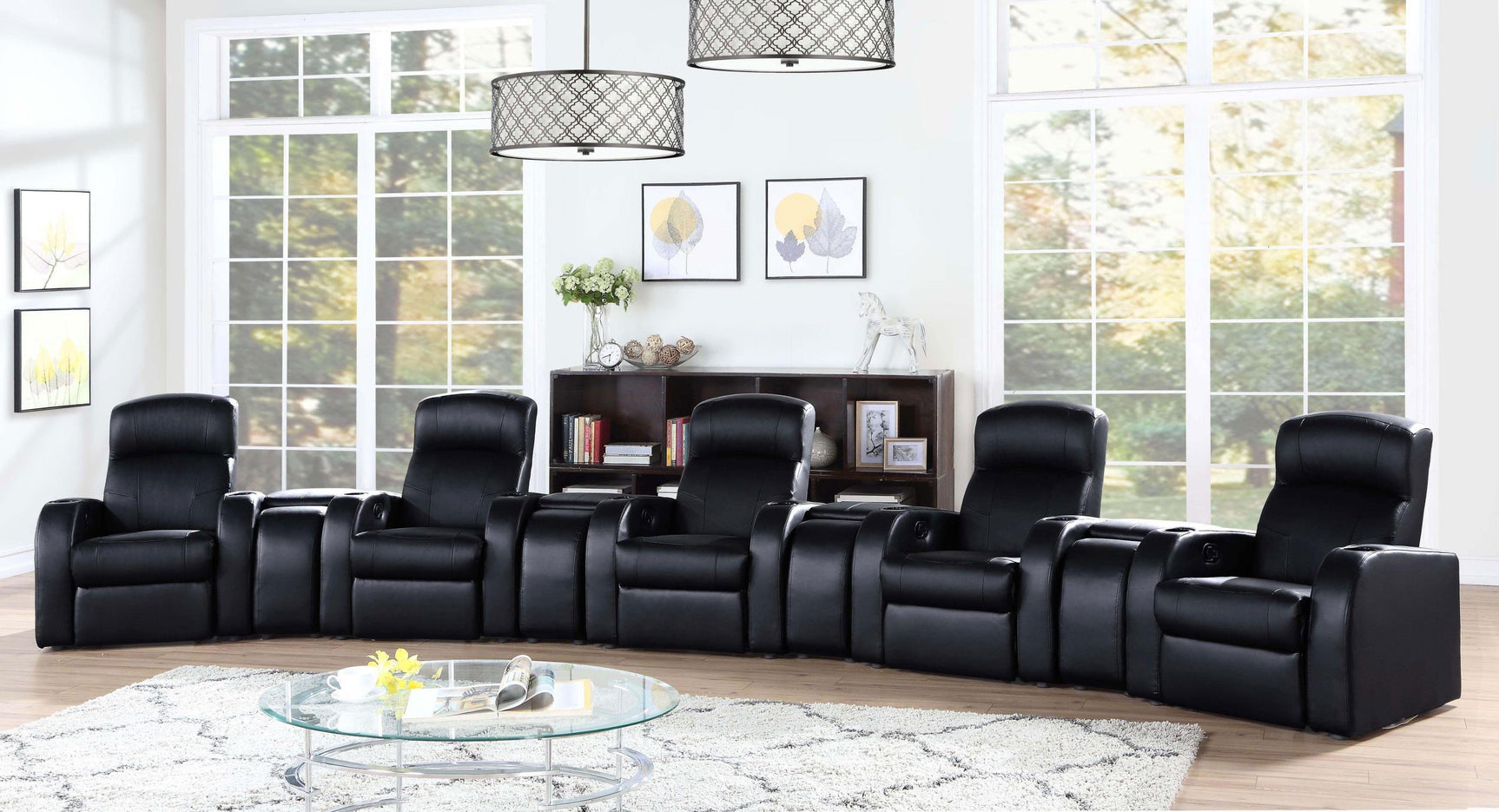Black upholstered home theater storage wedge console with rounded top surface
