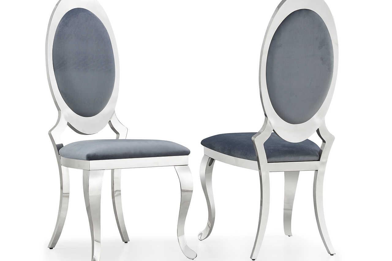 Black velvet oval dining chair with gold base angled