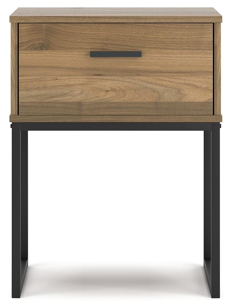 Close-up of walnut grain decorative laminate on nightstand